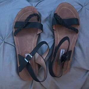 Brown and black sandals